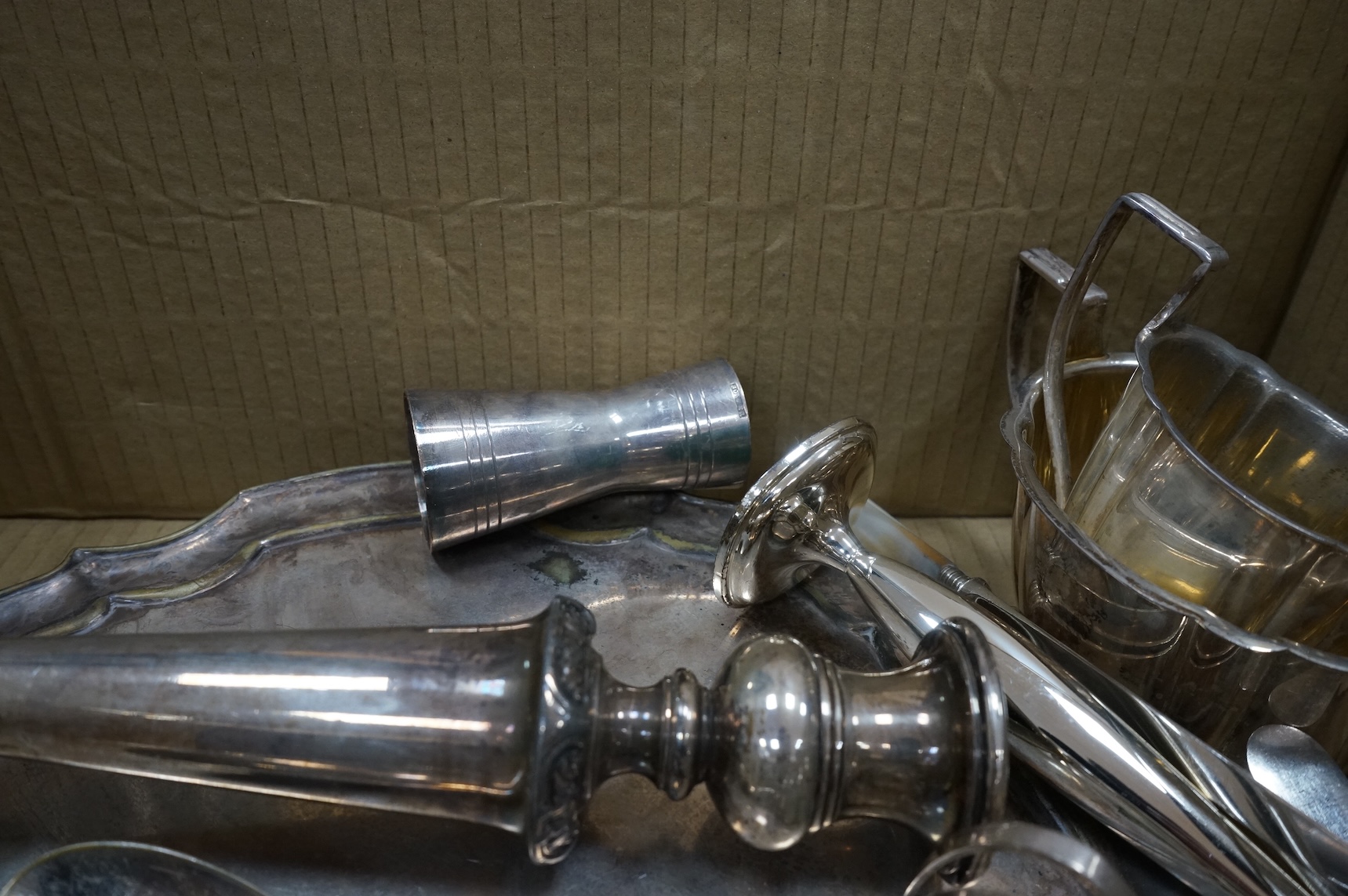A group of assorted plated ware, including a pair of candlesticks, a salver, toast rack and cutlery including set of mother of pearl handled dessert eaters, together with a George V silver mounted trinket box and two sil